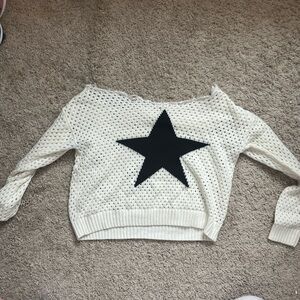 Amazon Off-the-Shoulder Cream Sweater with Black Star